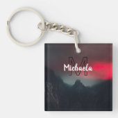 Burning clouds, fog and mountains monogram in sky キーホルダー (正面)