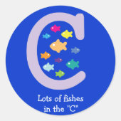 「C」色の金魚の多数々のくの魚 ラウンドシール (正面)