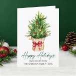 Calligraphy Ink Watercolor Pine Tree Red Bow Fold シーズンカード<br><div class="desc">Modern Elegant Calligraphy Ink Script Happy Holidays Folded Card includes a Watercolor Pine Tree in a paper bag with a Red Ribbon Bow,  Gold and Red Christmas Ornaments.</div>