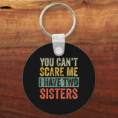 Can't怖がらせ私は2人の姉妹の兄弟を持っおもしろいている キーホルダー (正面)
