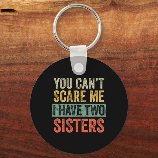 Can't怖がらせ私は2人の姉妹の兄弟を持っおもしろいている キーホルダー (正面)