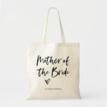 Casual Script | Chic Simple Mother of the Bride トートバッグ<br><div class="desc">This stylish and chic bridal party gift bag features modern,  casual black script typography that says "Mother of the Bride, " and a trendy scribbled heart,  with her name in simple bold text. The perfect elegant wedding gift for your entire wedding party.</div>