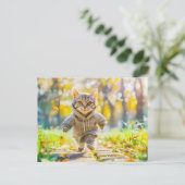 Cat in hoodie jogging through green park シーズンポストカード (スタンド正面)