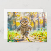 Cat in hoodie jogging through green park シーズンポストカード (正面/裏面)