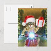 Cat in the Santa Claus hat delivers Christmas gift ポストカード (正面/裏面)
