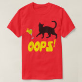 Cat Oops Funny Black Cat Knocking Over A Yellow Gl Tシャツ (デザイン正面)
