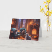 Cat pondering on Halloween in a cozy living room カード (黄色い花)