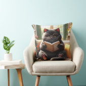 Cat reading a book on sofa クッション (椅子)