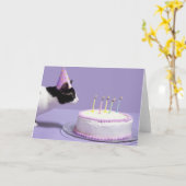 Cat wearing birthday hat blowing out candles カード (黄色い花)