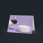 Cat wearing birthday hat blowing out candles カード<br><div class="desc">Cat wearing birthday hat blowing out candles on birthday cake | Steven Puetzer | AssetID: sb10064212b-001</div>