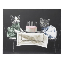 Cats celebrating a birthday with cake and candles ノートパッド