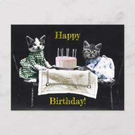 Cats celebrating a birthday with cake and candles ポストカード