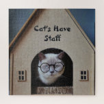 Cats Have Staff Quote Funny Cat Wearing Glasses ジグソーパズル<br><div class="desc">Design features image of a serious cat wearing black glasses while looking outside from house. Text reads what we all know to be true, "Cats Have Staff." Text template may be easily customized. This is for the 20" x 20" listing only. For all other sizes, please see the following listing:...</div>