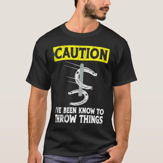 Caution i've been known to throw things horseshoe  tシャツ (正面)