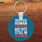 Caution Service Human Bite Training Still May Meme キーホルダー (正面)