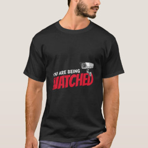 Cctvカメラを見ている Tシャツ