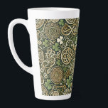 Celtic Bloom カフェラテマグ<br><div class="desc">Celtic Bloom feels like spring awakening in an ancient land where folklore still breathes. The intertwining Celtic knots suggest music that loops, weaves, and circles back on itself like a living tapestry of melody. Bright green tones evoke lively fiddle dances and warm sunlight filtering through mossy forests, while the golden...</div>