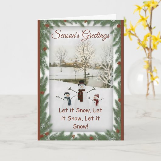 Charming snowmen serene winter landscape カード (黄色い花)