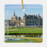 Chateau de Chantilly and Le Notre Garden - France セラミックオーナメント<br><div class="desc">View of the Chateau de Chantilly from Le Notre Garden with a fountain spraying water in the foreground - France</div>