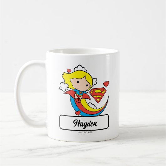 Chibi Supergirl Flying Rainbow コーヒーマグカップ (左)