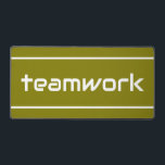Chic Modern White TEAMWORK Stripes On Golden Olive デスクマット<br><div class="desc">This sporty design features white modern TEAMWORK text and sleek edge stripes against golden olive background. The text and colors in this design can be personalized.</div>