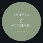 Chic Script Sage Green Minimalist Wedding ラウンドシール<br><div class="desc">Add a personal and elegant touch to your wedding favors, envelopes, or packaging with this minimalist round sticker featuring your custom name in a graceful script font. Designed to complement a modern and timeless wedding theme, this classic Sage Green and white design pairs beautifully with any part of your celebration....</div>