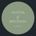 Chic Script Sage Green Minimalist Wedding ラウンドシール<br><div class="desc">Add a personal and elegant touch to your wedding favors, envelopes, or packaging with this minimalist round sticker featuring your custom name in a graceful script font. Designed to complement a modern and timeless wedding theme, this classic Sage Green and white design pairs beautifully with any part of your celebration....</div>