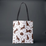 Chocolate Cats トートバッグ<br><div class="desc">This charming tote bag features a captivating chocolate brown cat silhouette pattern. The design is both elegant and adorable, making it a perfect accessory for cat lovers and those who appreciate subtle, stylish designs. It's a practical and fashionable way to carry your essentials while showcasing your love for feline friends....</div>