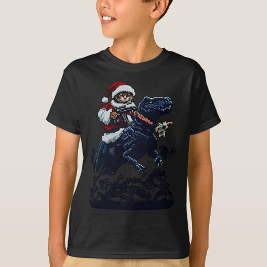 Christmas Cat In Santa Hat Holding A Gun And Dinos Tシャツ (正面)