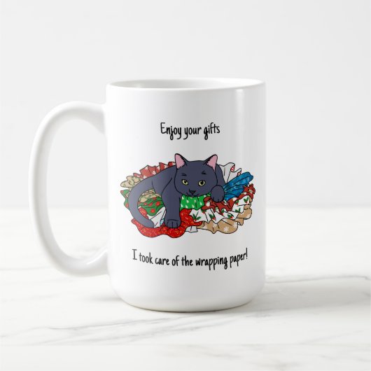 Christmas cat with wrapping paper コーヒーマグカップ (左)