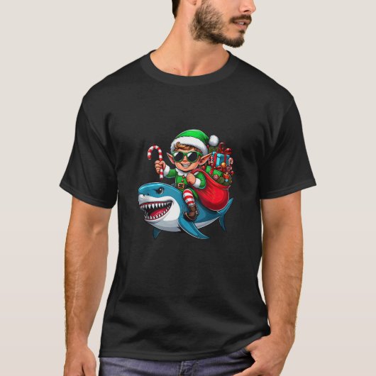 Christmas Elf Riding Shark Santa Hat Candy Cane Xm Tシャツ (正面)