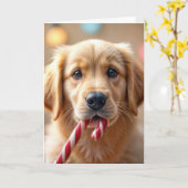 Christmas Golden Retriever Puppy and a Candy Cane カード (黄色い花)