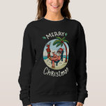 Christmas in July スウェットシャツ<br><div class="desc">Funny Christmas design featuring an illustration of Santa Claus relaxing at the beach under a palm tree on a little island. A perfect match for Christmas in July as well as for real Christmas in December.</div>