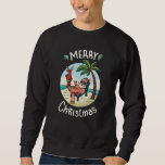 Christmas in July スウェットシャツ<br><div class="desc">Funny Christmas design featuring an illustration of Santa Claus relaxing at the beach under a palm tree on a little island. A perfect match for Christmas in July as well as for real Christmas in December.</div>