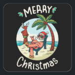 Christmas in July スクエアシール<br><div class="desc">Funny Christmas design featuring an illustration of Santa Claus relaxing at the beach under a palm tree on a little island. A perfect match for Christmas in July as well as for real Christmas in December.</div>
