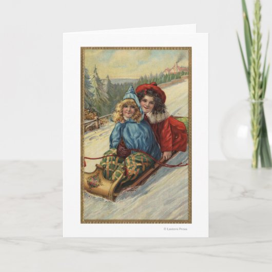 ChristmasTwoの小さな女の子のSledding シーズンカード (正面)