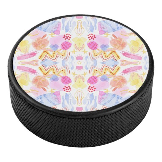 Circular object featuring a colorful abstract  アイスホッケーパック (3/4)