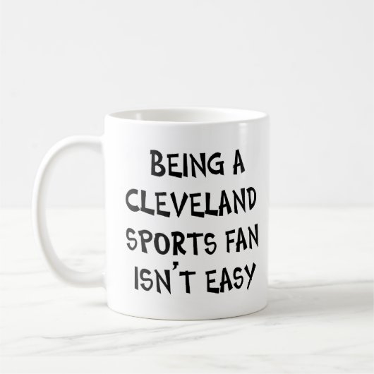 cleveland sports fan, being コーヒーマグカップ (左)