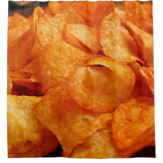 Close up of juicy, crispy, chips on black plate. シャワーカーテン