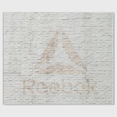 Close-up photo of Reebok logo on wall ラッピングペーパー (フラット)