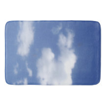 clouds in blue sky bath mat