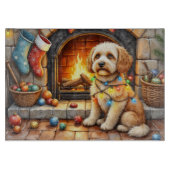 Cockapoo Sitting by Fireplace with Christmas Light カッティングボード (正面)