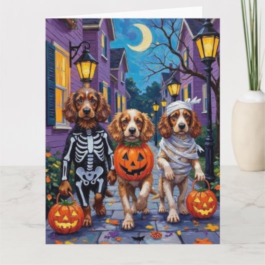 Cocker Spaniel Dogs Trick-or-Treating in Halloween カード (正面)