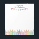Colored Pastel Pencils Note From School Teacher ノートパッド<br><div class="desc">A note from School Teacher notepad personalized with the teacher's name above a multi-colored pastel bunting banner and a row of colored pencils, some with patterns, in pastel rainbow colors. Kindergarten teacher notepad with pastel pencils and a bunting flag banner in pastel shades of the rainbow, with some patterns like...</div>