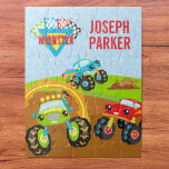 Colorful Little Boy Monster Trucks with First Name ジグソーパズル<br><div class="desc">Add a bit of fun to your little boy's bedroom with this cute jigsaw puzzle that has three colorful monster trucks. There is a green monster truck driving through a ring of fire, a red monster truck watching, and a blue monster truck jumping over a dirt pile. There are also...</div>