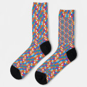 Colorful socks with a vibrant geometric pattern ソックス (左)