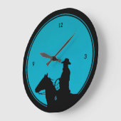 Cowboy Silhouette on Turquoise ラージ壁時計 (傾斜)
