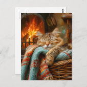 Cozy Cat Sleeping in Basket by Warm Fireplace ポストカード (正面/裏面)
