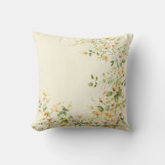 Cream-colored pillow with delicate watercolor flor クッション