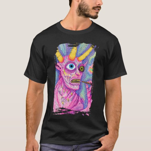 Creature with horns and something in its mouth tシャツ (正面)